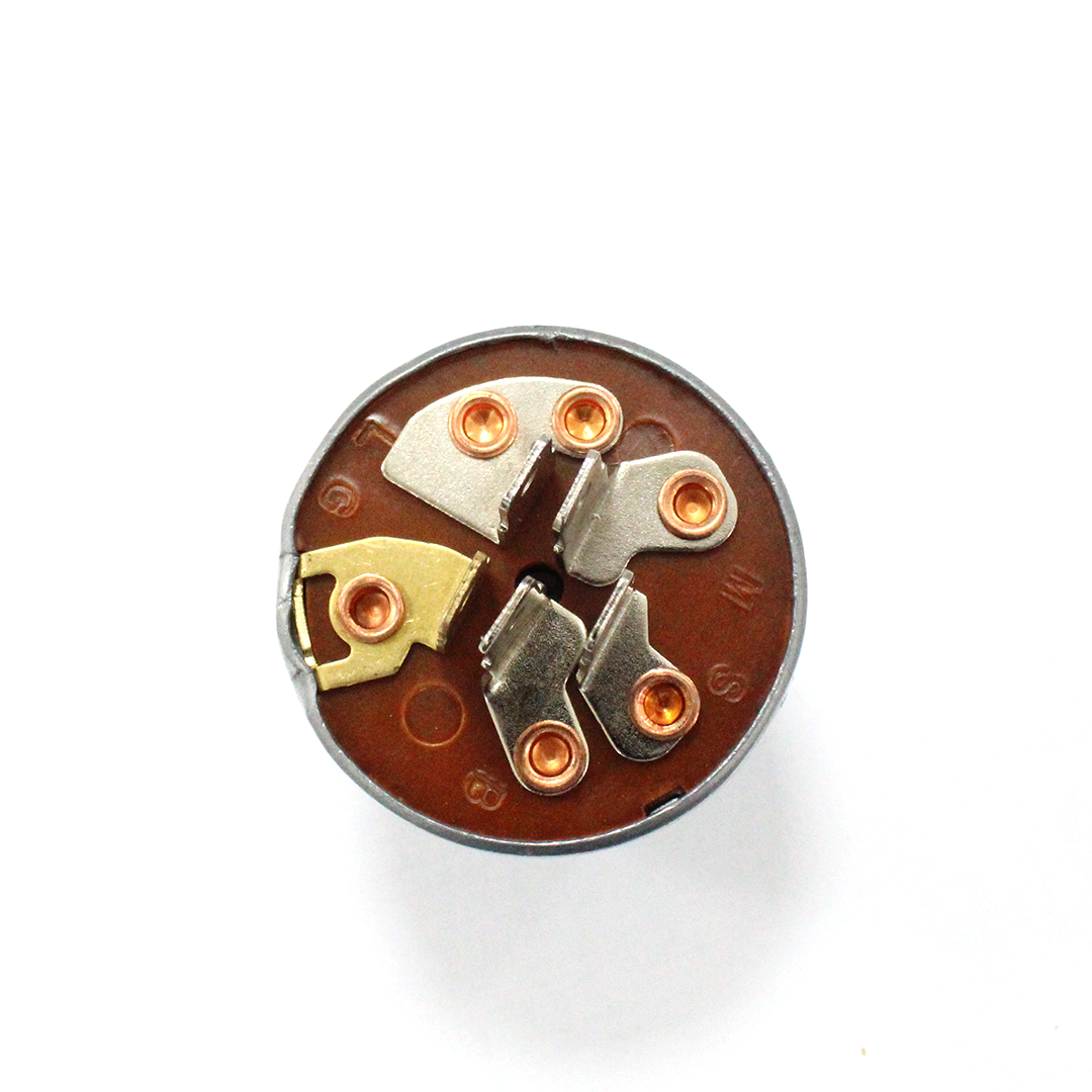 Back side of ignition switch showing electrical terminals for John Deere 140, 200, and 210 models